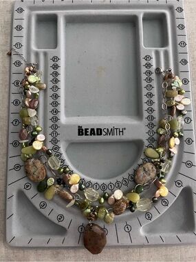 Multistrand Green and Earth-Tone Beaded Statement Necklace.